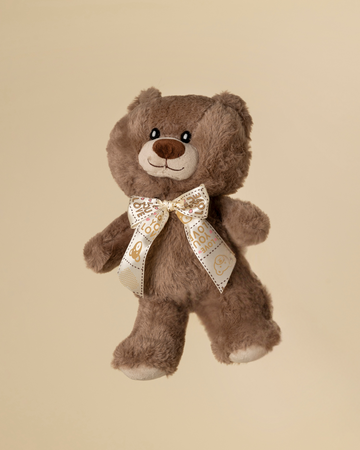 Peluche teddy marrón oscuro con lazo